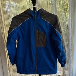 Columbia Titanium RainJacket in Blue with Gray Accents. Lined with Mesh